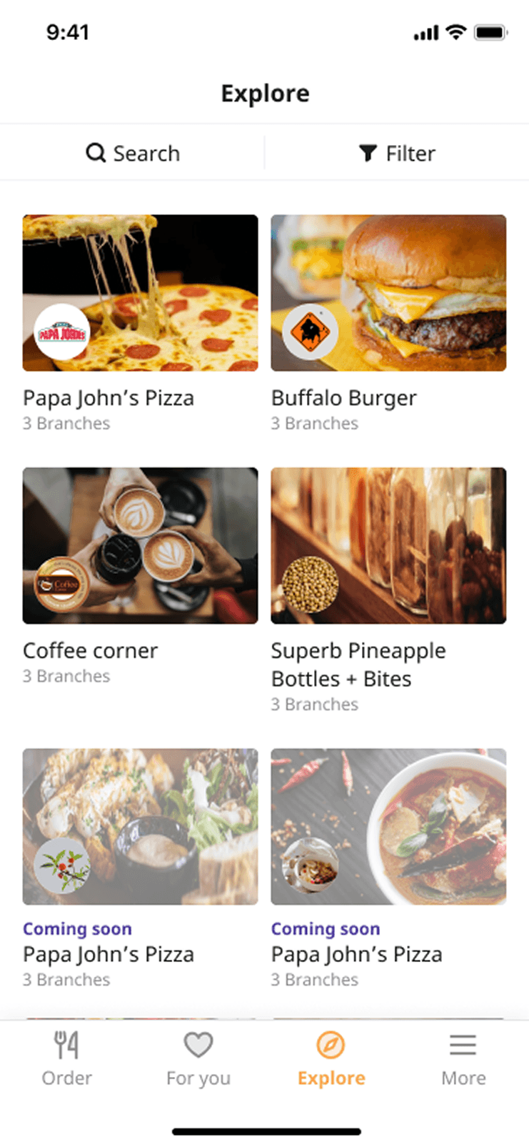 The 2021 Explore page, a grid of restaurant cards with branch counts and a coming soon label on two of them.