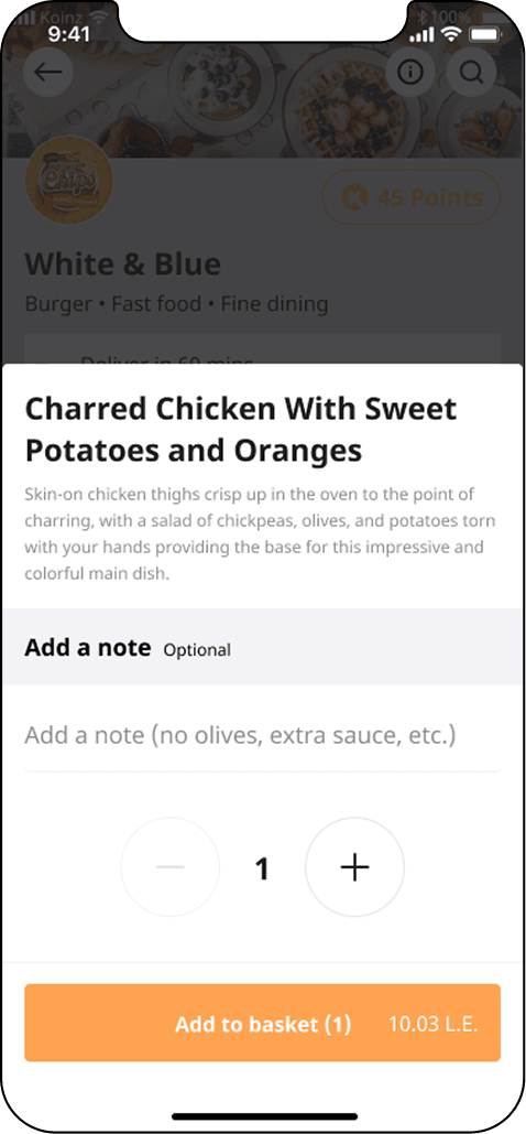 An item sheet opening over the restaurant page, with the dish name and description, an optional note field, a quantity stepper, and an active add to basket button carrying the price.