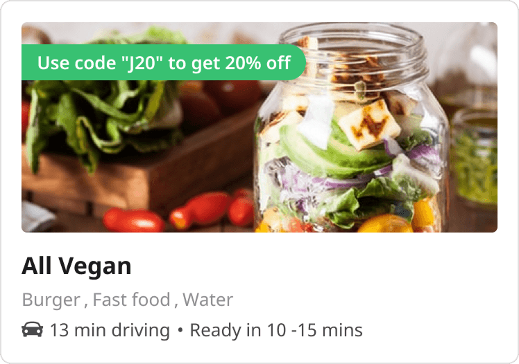 A restaurant card from the 2021 Order page carrying a green badge reading Use code J20 to get 20% off, above the restaurant name, cuisines and delivery estimate.